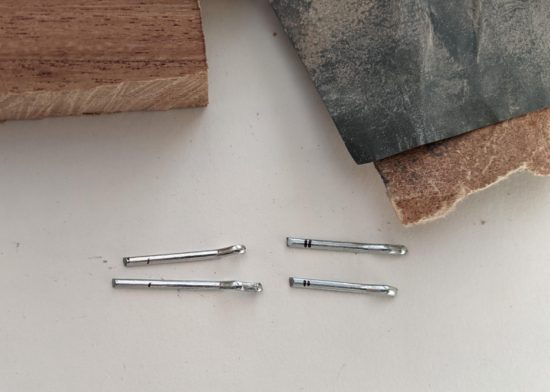 Unsanded cotter pins on the left, sanded pins on the right