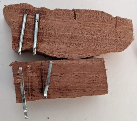 I was able to dislodge the cotter pins on the smoother wood scraps
