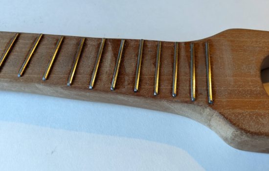 Messily glued frets