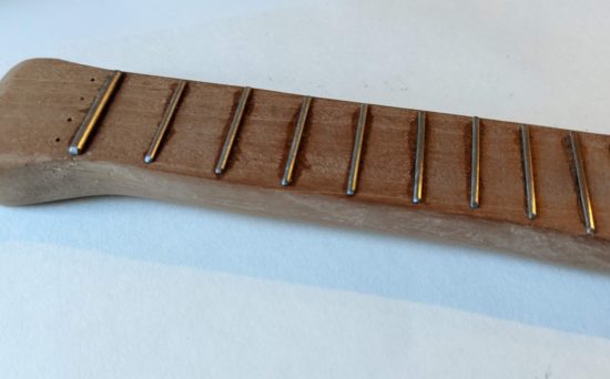 Neatly glued frets