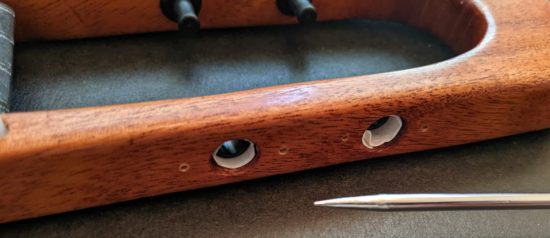 Holes slightly widened without the tuners in place