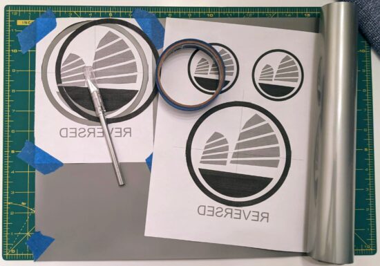 Design printed, taped, and partially cut out