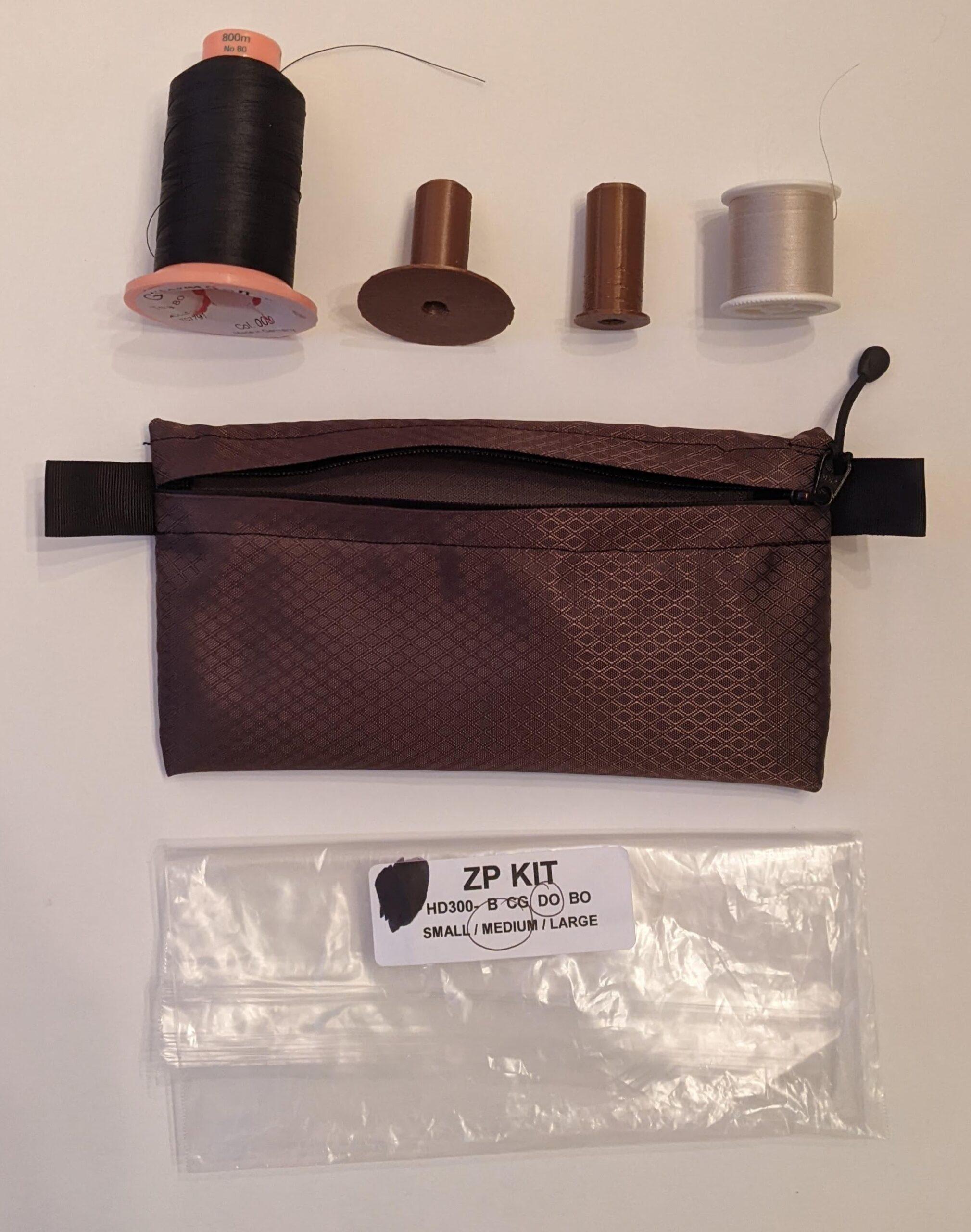RBTR zippered pouch, and spool adapters pictured
