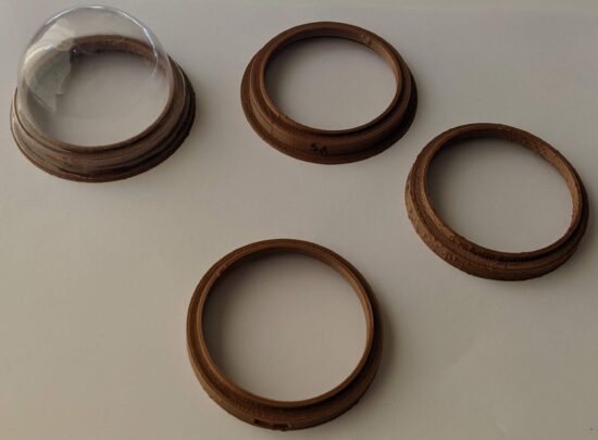 Different tries at dome enclosure bases