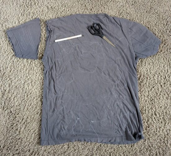 Design drawn on shirt, one shoulder used for testing string tension