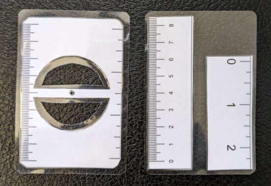 Laminated and cut, side by side with prior janky version