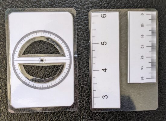 Laminated and cut, side by side with prior janky version